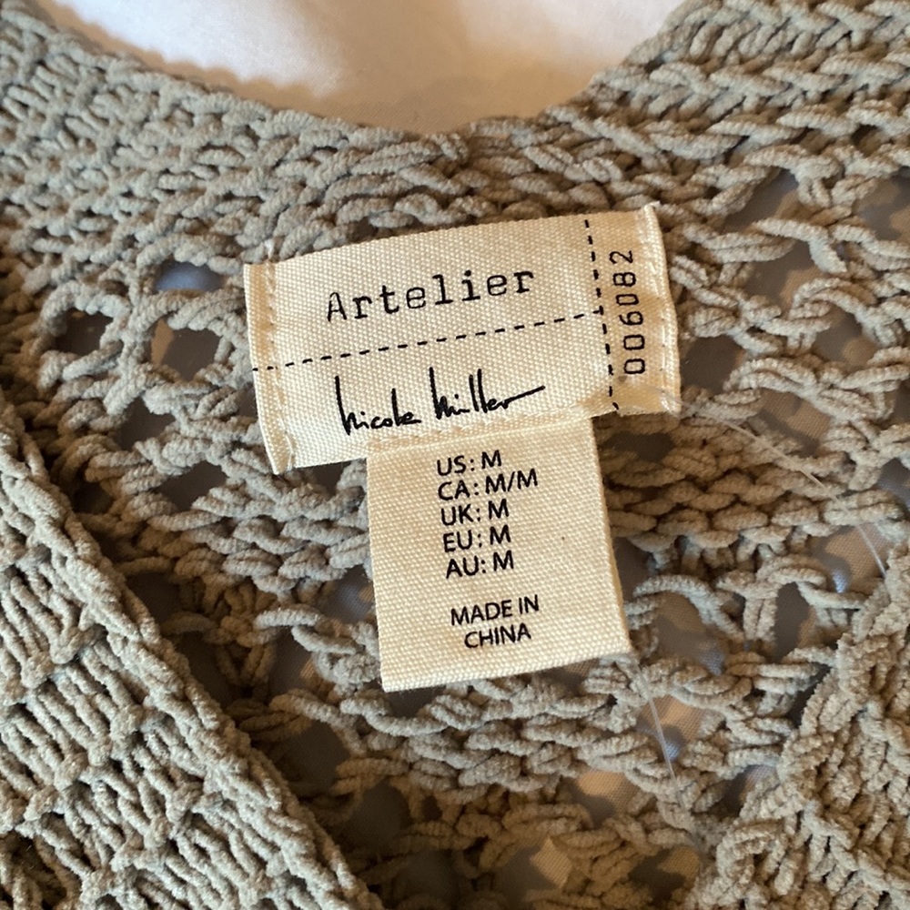 NWT Crocheted sweater.